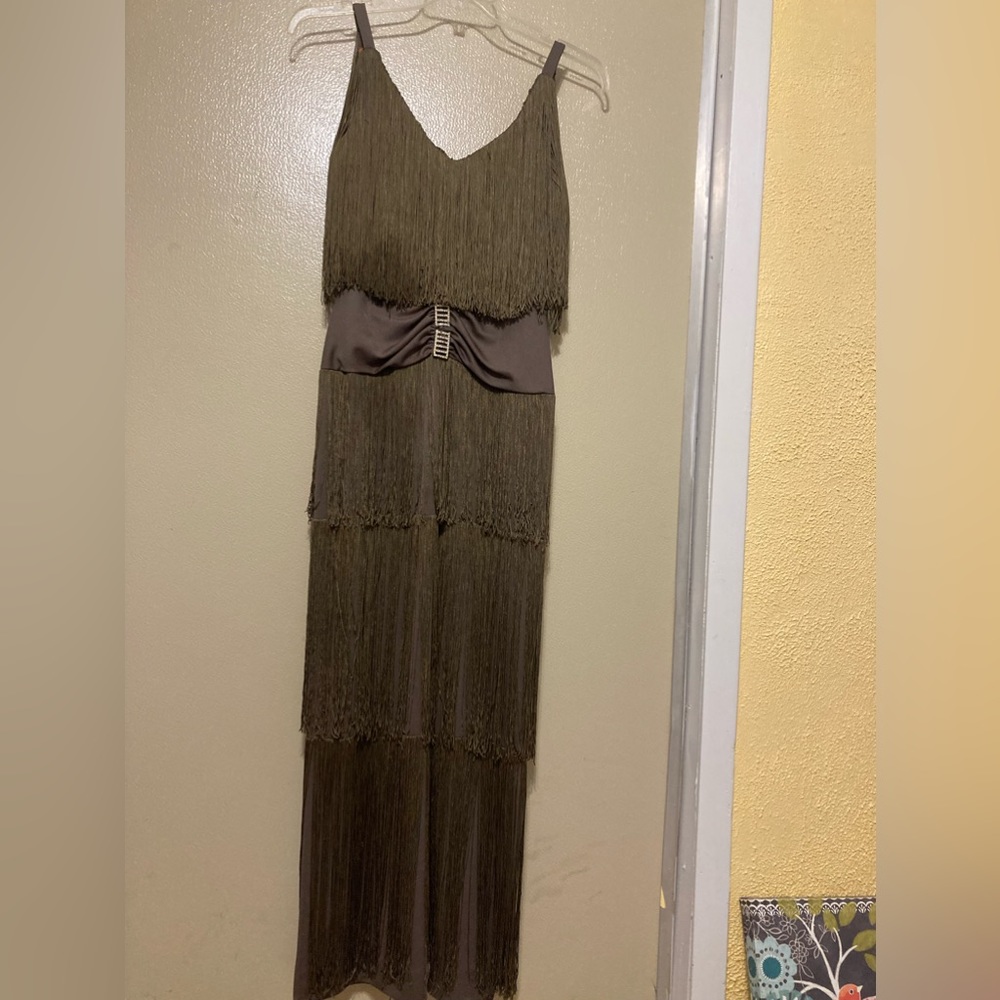 One of a kind! Gorgeous on.. sorry no hanger appeal. Long fringe that hugs body.